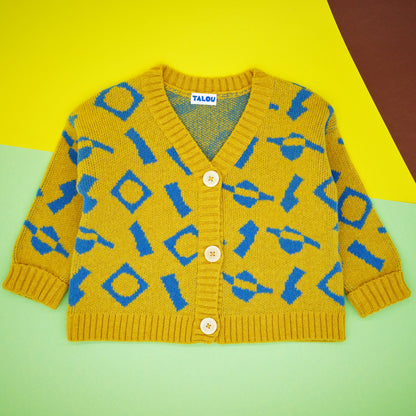 Yellow and blue jacquard, children's wool cardigan with buttons and fold back cuffs.