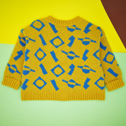 Back of children's wool cardigan, in a blue and yellow jacquard knit.